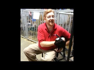 Fat Guy and a Little Goat