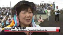 Japan's live fire drills shore up public support in push for stronger military