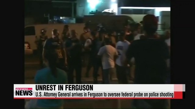 U.S. Attorney General arrives in Ferguson to oversee federal probe on police shooting