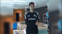 Thibaut Courtois gets the ice bucket treatment from Cesc Fabregas