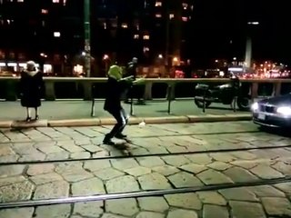 Alien lends a helping hand to older pedestrian