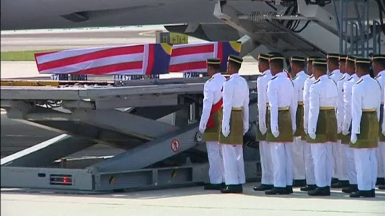 MH17: Plane with Malaysian bodies arrives in Kuala Lumpur