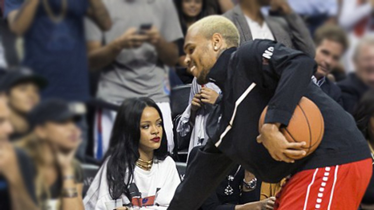 Rihanna Check Out Chris Brown At Basketball Gam...