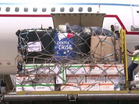Dans l'avion de l'exil vers la France, des réfugiés chrétiens irakiens parlent