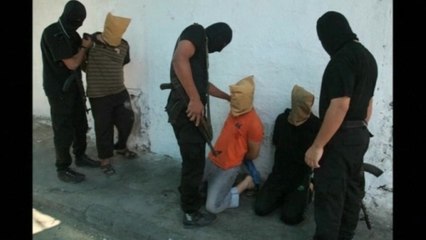 Hamas-led gunmen execute 18 "collaborators" in Gaza