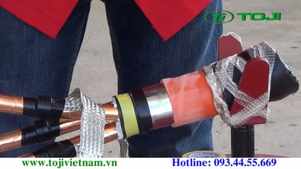 4.Video huong dan lam dau cap co rut nguoi 3M -Buoc 4-Quan bang Mastic [TOJI.VN] Phan phoi dau cap 3M-T-plug Elbow 3M-Hop Noi 3M-Bang Keo 3M-Son xit cach dien 3M-May do loi cap ngam