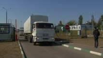 First trucks from aid convoy to Ukraine cross back into Russia