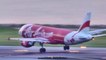 Hong Kong Airport Spotting. AirAsia Airbus A320 Landing in the Evening