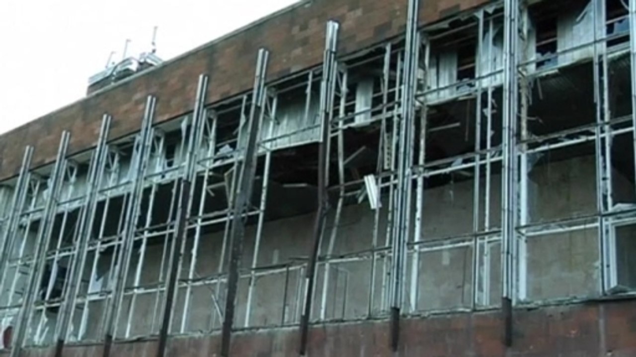 Merkel meets Ukraine's leaders ahead of peace talks, as Donetsk shelling intensifies