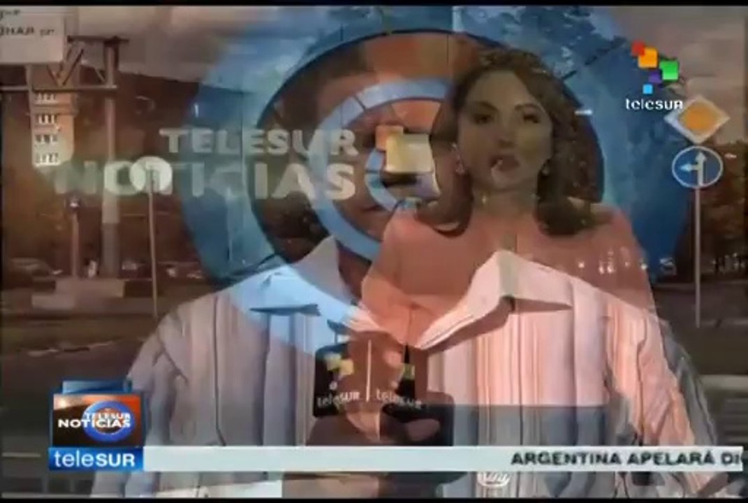 Merkel "persuade" a Poroshenko para negociar la paz con federalistas