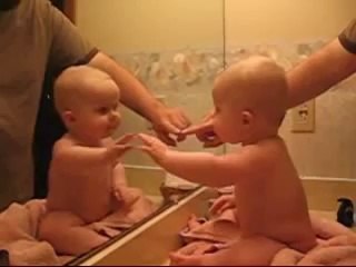 funny baby in the mirror. CUTE! cute! CUTE!.