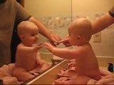 funny baby in the mirror. CUTE! cute! CUTE!.