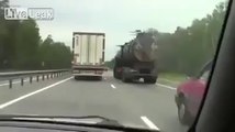 Unusual truck while driving along the highway.