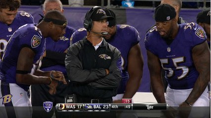 Ravens players dance on sideline