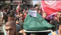 Israéliens et Palestiniens enterrent leurs morts en pleins bombardements