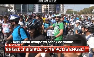 Engelli bisikletciye polis engeli.