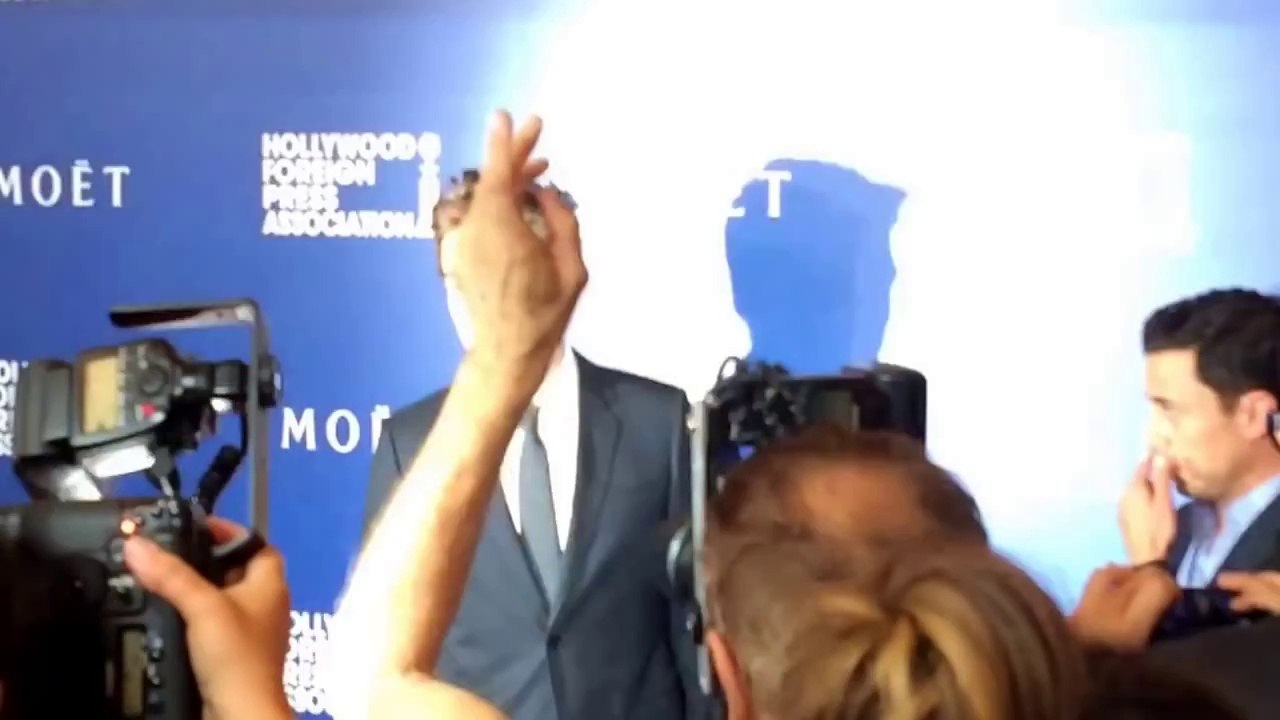 Robert Pattinson Poses on the HFPA Red Carpet 8-14-14