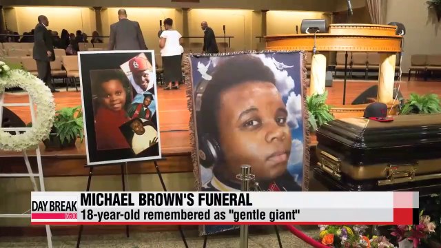 Michael Brown laid to rest, remembered as gentle giant
