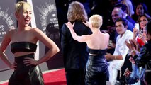 Miley Cyrus Brings Homeless Guy to VMAs