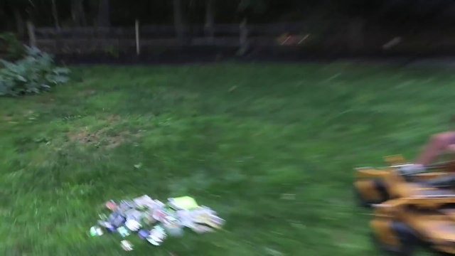 Crazy Dad destroying his son's Video Games with a lawn mower!