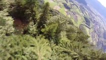 Wingsuit flight in the Alps, so so close to the trees!
