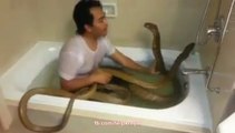 Boy Taking Bath with Snake