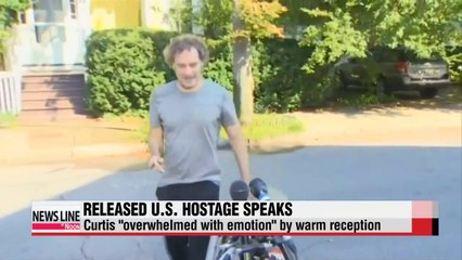 Mother of captured American journalist releases video plea