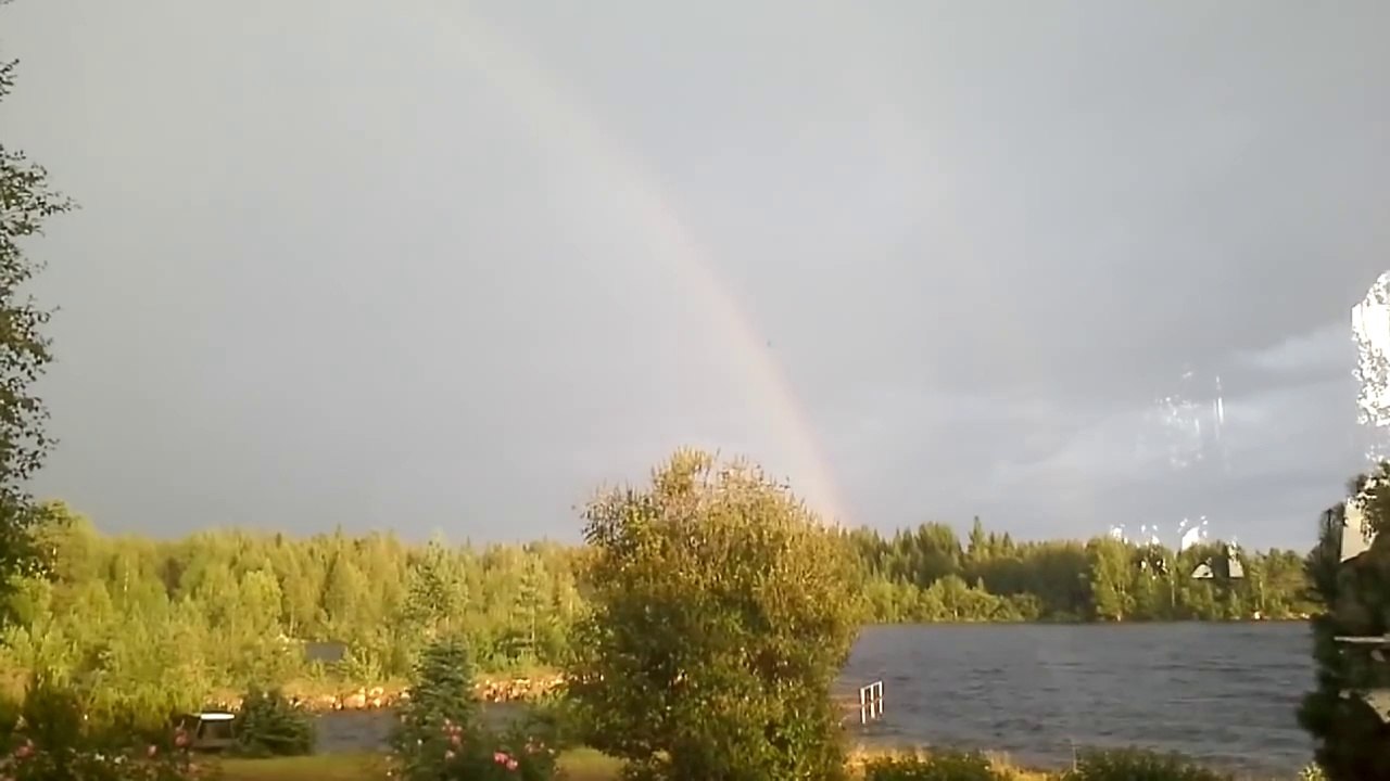 Rainbow Admirer Almost Gets Hit By Lightening