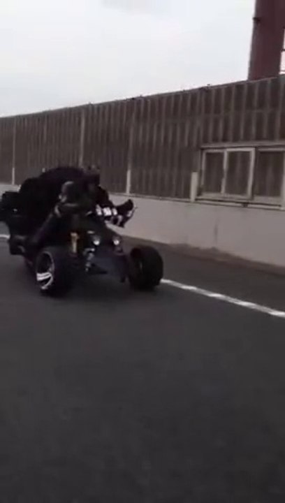 Batman Riding Bat-Trike On Japanese Highway