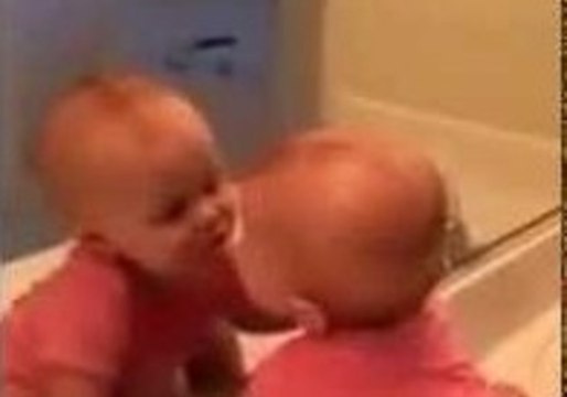 Baby Kisses Herself in Mirror
