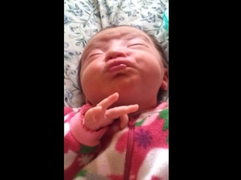 Newborn baby makes adorable facial expressions