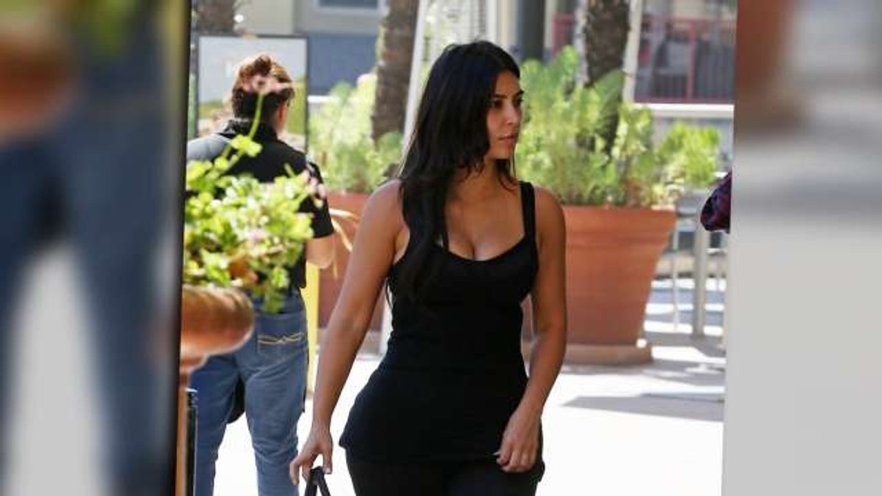 Kim Kardashian Shows Off Famous Curves