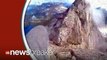 Terrifying Video Shows Mountain Climbers Crawling Along Narrow Summit
