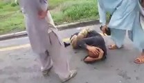 Police Man Beaten By PAT & PTI Workers On Road