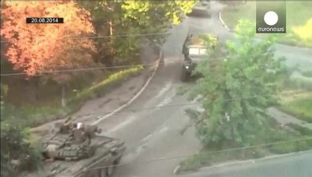 Ukraine troops quit Luhansk airport, accusing Russia of turning tide of war