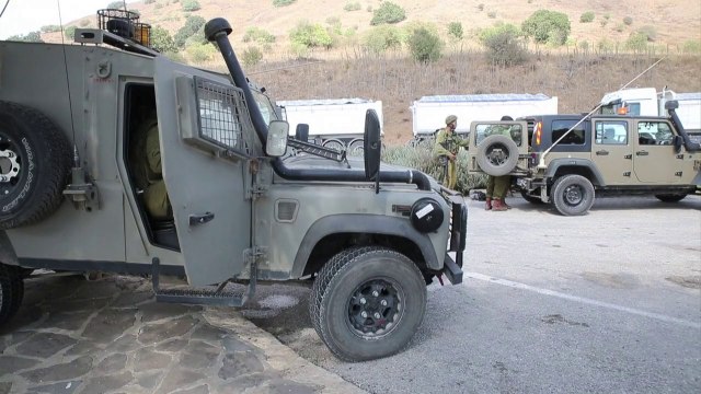 Syria army battles rebels in Golan Heights