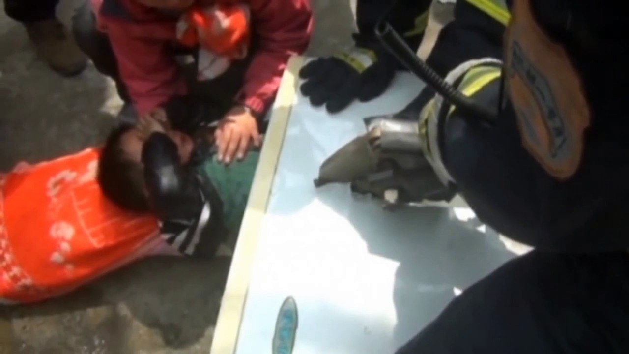 Un enfant coincé dans le tambour d'une machine à laver en Chine