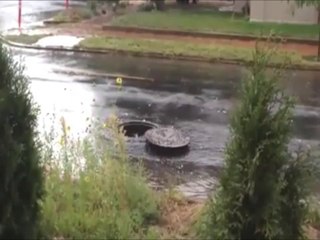 Yağmurda Patlayan Rögar Kapağı