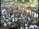Separate marchers joined hands by sharing container today