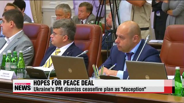 Ukraine, Russia agree on peace moves but fighting continues