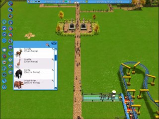 BBJewel sat in her bra eating peanuts whilst playing Rollercoaster Tycoon