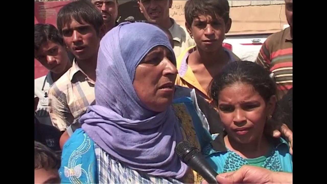 Irak: miliciens et habitants d'Amerli célèbrent la fin du siège