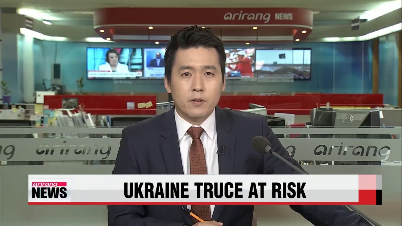 Shelling in two Ukrainian cities puts fledgling ceasefire at risk