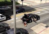 Commuters of Downtown Los Angeles Stop Traffic to Help Duckling