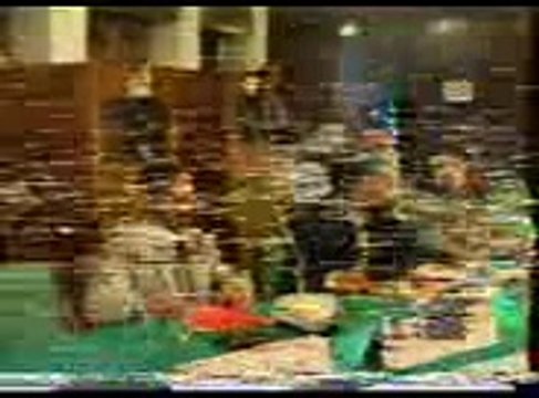 Ehsan Sehgal delivering his speech in Baghdad, Iraq in 1994.