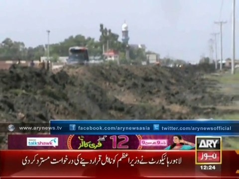 Sharif Brothers protecting their assets from flood