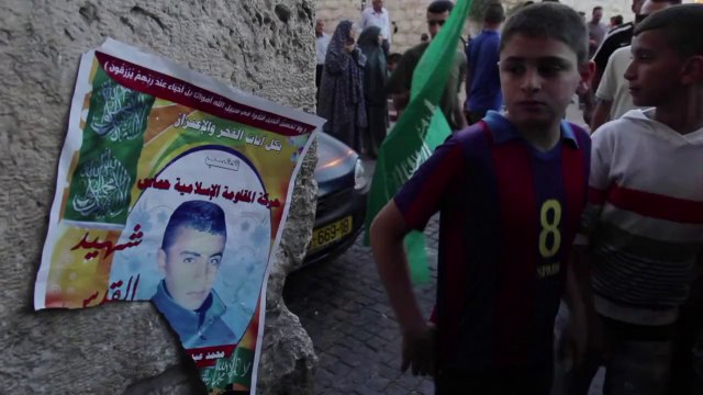 Palestinians hold funeral for teen shot by Israeli police