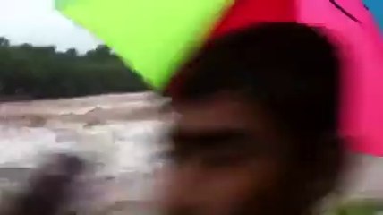 Flood in Nala Ban flowing over the bridge at Sehyore Khuiratta Flood 2014