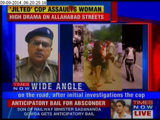 Cop slaps woman in full public view