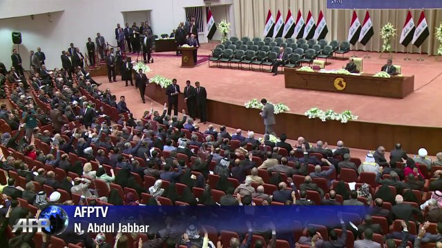 Iraq MPs approve new government, Kerry to visit region